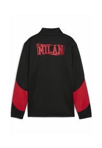 Sort sweatshirt med røde accenter på ærmerne. Bagsiden viser "AC MILAN!" i fed, slidt rød skrift på en sort baggrund.