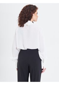 Rinascimento Bluse - bianco