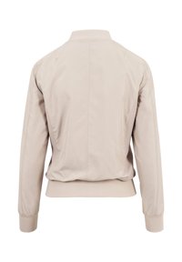 Bézs bomberdzseki bordázott gallérral és mandzsettával, sima textúrával, oldalsó hálós panelekkel és alakra szabott derékpánttal. Hátulnézet.