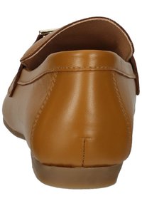 Braune Lederschuhe mit abgerundeter Ferse und glatter Textur. Verfügen über eine genähte Naht und ein kleines Akzentstück in der Nähe der Ferse.