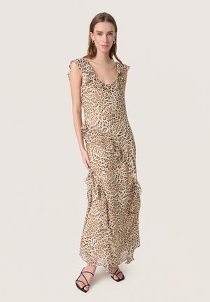 Leopard print maxi dress with ruffled sleeves, made of lightweight fabric, features a V-neckline and layered ruffle hem. Black strappy heels.