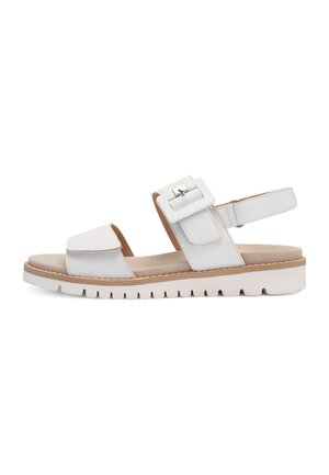 White open-toe sandal with wide straps, a large square buckle, adjustable heel strap, and a cushioned grooved sole.
