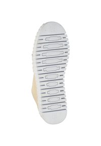Lichtbeige schoen met een gestructureerde witte rubberen zool met horizontale groeven en patroondetails. Maat gemarkeerd als 37.