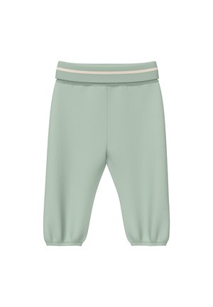 Lichtgroene peuterbroek met elastische tailleband met een lichtbeige streep en elastische boorden bij de enkels op een witte achtergrond.