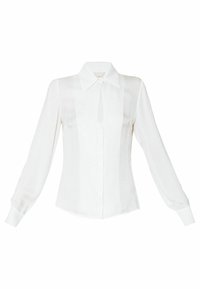 Camicia bianca con bottoni, maniche lunghe, motivo testurizzato, colletto a punta e dettaglio a chiave sul davanti. Tessuto morbido con leggero lucido.
