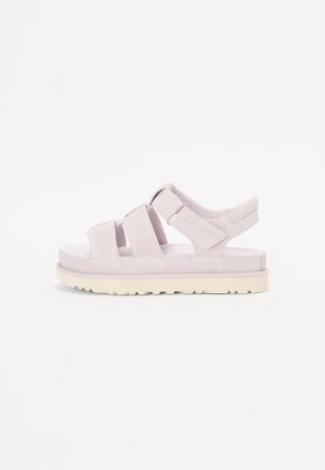 Světle růžové sandály s silnýminubukovými pásky, polstrovanou stélkou a bílou gumovou podrážkou s protiskluzovým vzorem.