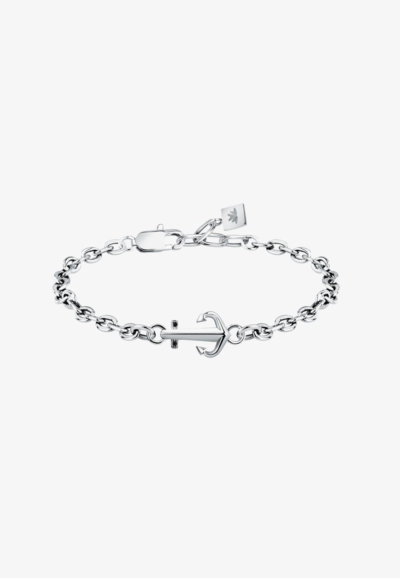 Bracciale in argento a forma di ancora con anelli chiusi interconnessi e chiusura a moschettone. Piccola etichetta con logo attaccata alla catena. Texture liscia.