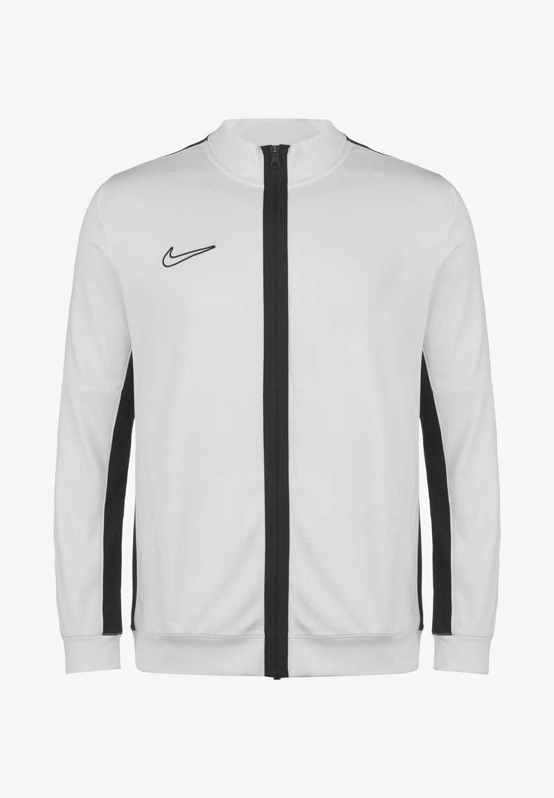 White Nike jacket featuring a high collar, black side stripes, and a front zip closure. Soft fabric with a smooth texture.