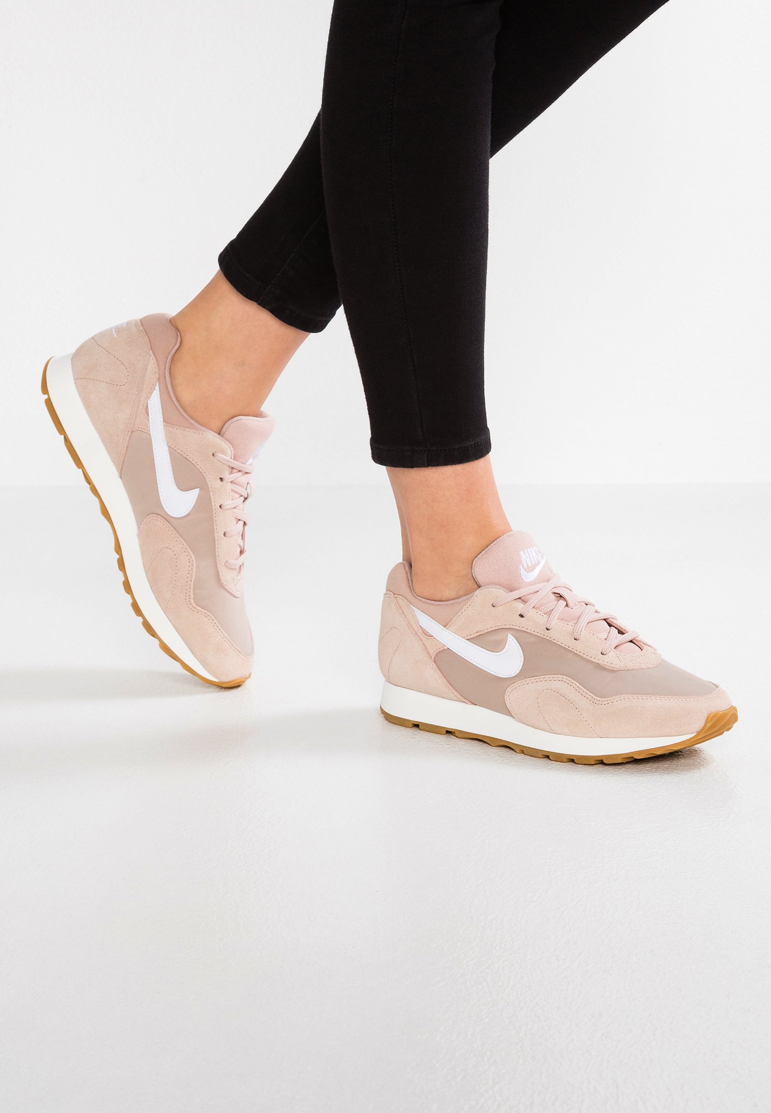 nike outburst trainers in beige