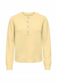 Hele kollane, pikkade varrukatega kampsun ümar kaelusega, mille keskel on viis dekoratiivset nööpi ning soonikkoes varrukasääred ja ääred.