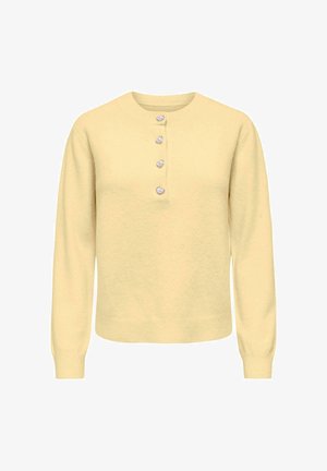 Lichtgele trui met lange mouwen en een ronde hals, voorzien van vijf decoratieve knopen in het midden en geribbelde manchetten en zoom.