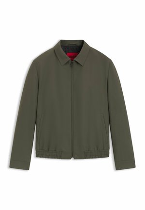 Olive green jacket with a collared neckline, front zipper, side pockets, and elasticized hem. Made from smooth, lightweight fabric.