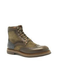 Brązowe skórzane i oliwkowe zamszowe botki za kostkę z detalami w stylu brogue, sznurówki z przodu i gumowa podeszwa. Posiada metalowe oczka i zamek błyskawiczny.