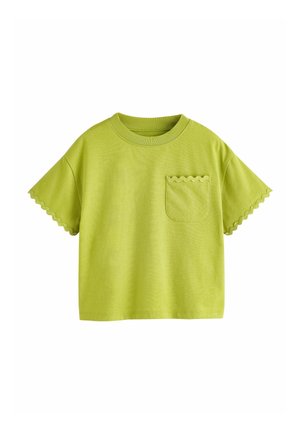 T-shirt vert citron à manches courtes avec bords festonnés sur les manches et la poche, col rond, coupe décontractée.