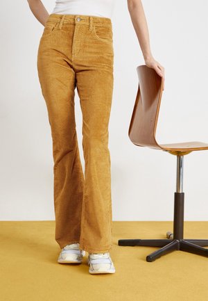 Flared jeans - light brown