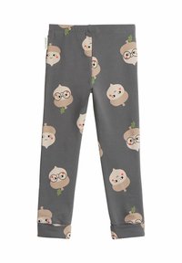 Harmaat legginsit, joissa on leikkisä tammenhedelmäkuosi, jossa on kasvoja ja laseja. Pehmeä kangas, joka istuu tiukasti ja nilkkasuojat.