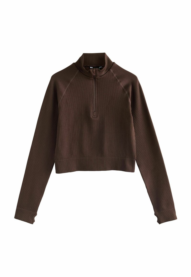 Brown cropped pullover with a high collar, half zipper, and ribbed texture. Features fitted long sleeves with thumbholes and raglan seams.