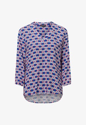 Blaue und rote gemusterte Bluse mit drei Viertelärmel, V-Ausschnitt und abgerundetem Saum. Leichter Stoff mit einem durchgehenden Augendesign.