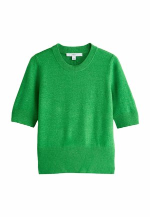 Pull en maille vert à manches courtes avec poignets et ourlet côtelés, doté d'un col rond et d'une étiquette de vêtement à l'intérieur du col.