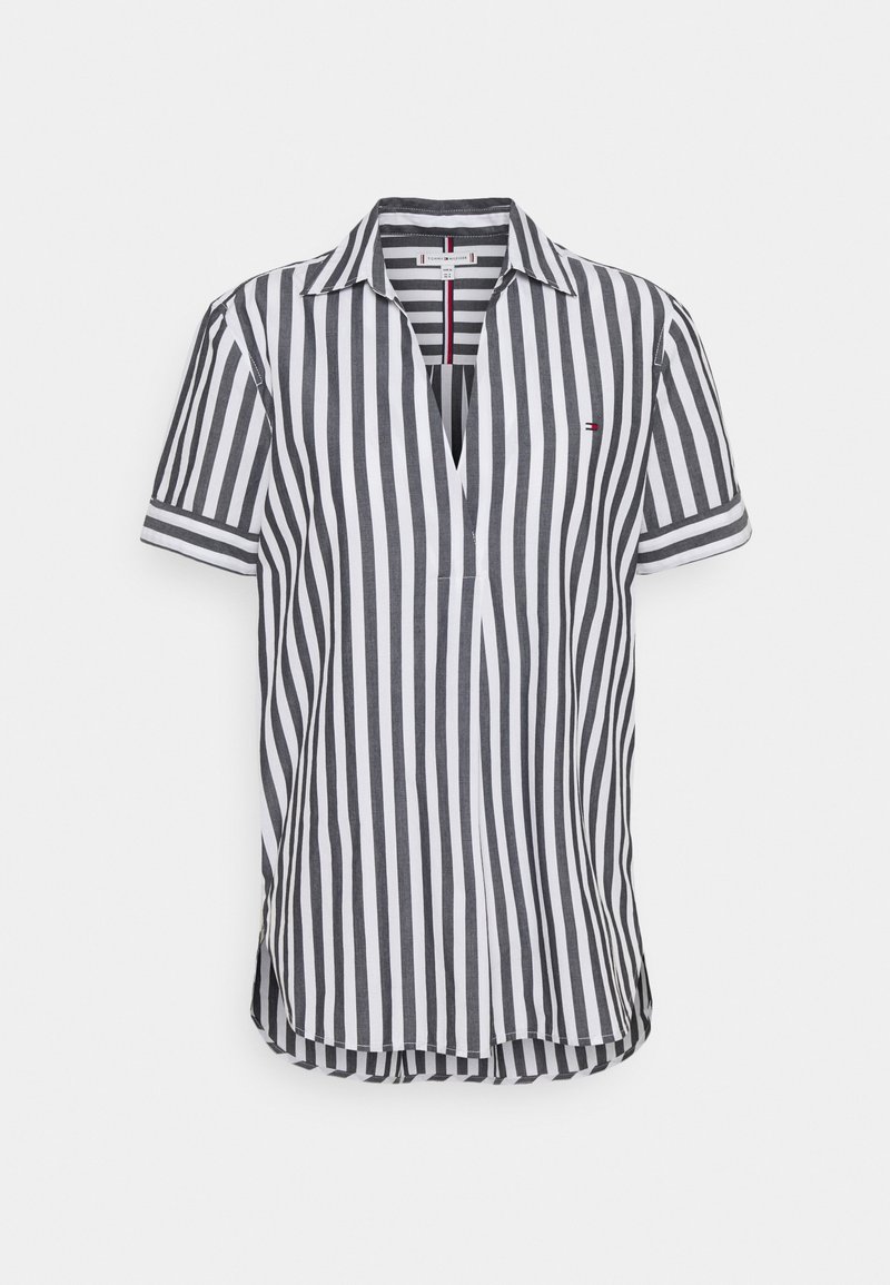 Kortærmet skjorte i sort og hvid striber, med krave, frontknaplukning og sideslids for en løs pasform. Bomulds materiale, glat tekstur.