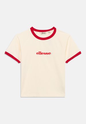 Short cream-colored T-shirt with red trim on collar and sleeves, featuring "ellesse" logo in red text on the chest.