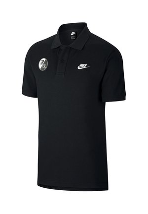 Sort kortærmet Nike polo med krave, to knapper, Nike-logo på højre bryst og en rund emblem på venstre bryst.