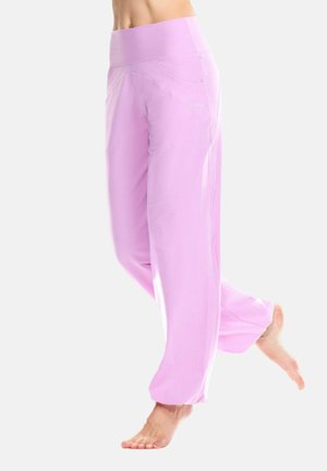 Light pink wide-leg pants with a high waistband, made from smooth fabric. Features side pockets and a relaxed fit.