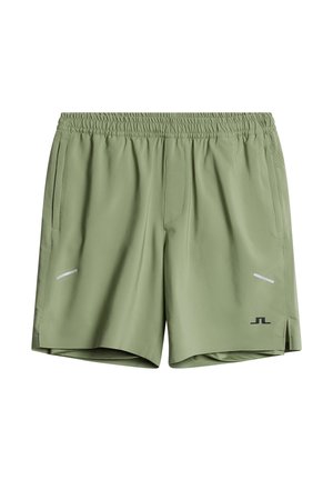 Ljusgröna atletiska shorts gjorda av lättviktig tyg, med en elastisk midja, två sidfickor och reflexdetaljer.