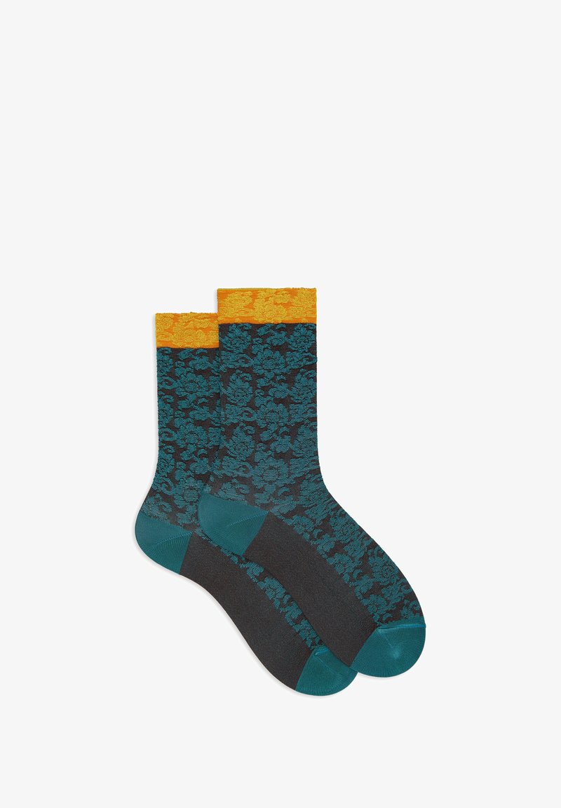 Calze in misto cotone con un motivo floreale teal su sfondo nero, con polsini a coste arancioni e punta teal a contrasto.