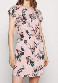 Floral dress with a pink background, featuring green and burgundy leaves and white butterflies. Short sleeves and an adjustable waist tie.