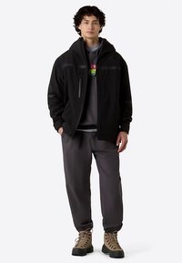 The North Face U NSE SOFTSHELL HOODIE - Outdoor jacket - tnf black