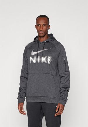 Dark grey Nike hoodie with a front kangaroo pocket, a white logo design, drawstring hood, and a zippered sleeve pocket for storage.