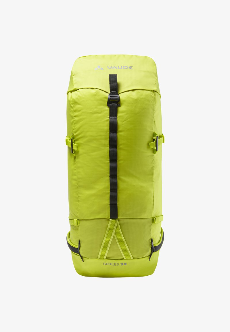 Sac à dos vert citron avec un design à rabat, ferrures noires, bretelles ajustables et une étiquette de capacité "SÉRIE 32" en bas.