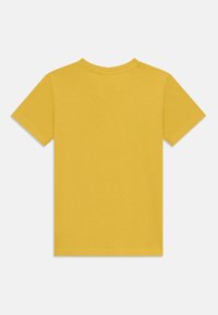 Champion GRAPHIC CREW NECK UNISEX - Camiseta estampada - yellow