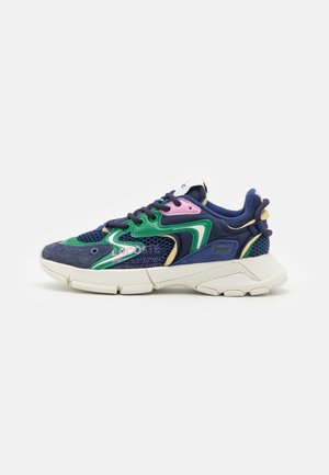 Navy, green, pink, and beige Lacoste sneaker with mesh and suede panels, thick sole, and lace-up closure, shown in side profile.