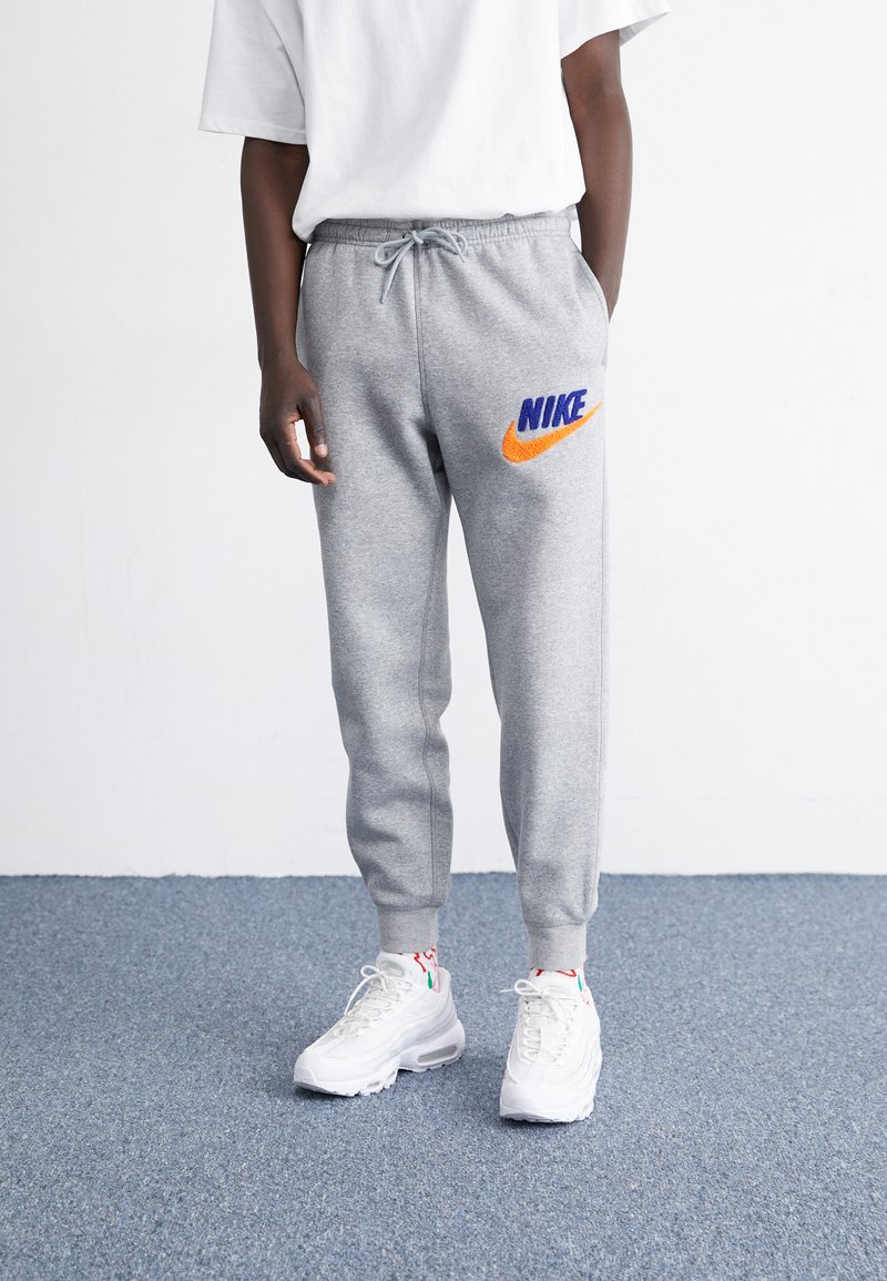 Nike Sportswear JOGGER - Träningsbyxor - dark grey heather