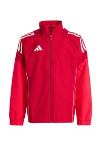 Rote Sportjacke mit Reißverschluss, weißen Streifen an den Schultern und elastischen Bündchen. Aus leichtem, strapazierfähigem Material gefertigt.