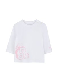 T-shirt blanc en coton à manches courtes, orné d'un graphisme rose représentant des animaux joueur et de la lettre "B" sur le devant ; fermeture à boutons-pression à l'épaule.