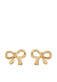 Złote kolczyki stud w kształcie kokardek z centralnym akcentem w postaci cyrkonia. Gładkie, wypolerowane wykończenie z zakrzywionymi akcentami.