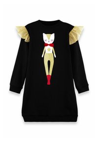 Vestido suéter negro con mangas de volantes dorados brillantes. Presenta un gráfico de un gato blanco con un traje dorado, corbata roja y diseño de estrellas.