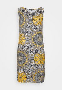 Robe sans manches à motif jaune et noir, présentant des designs circulaires complexes et un col drapé. Fabriquée en tissu léger.