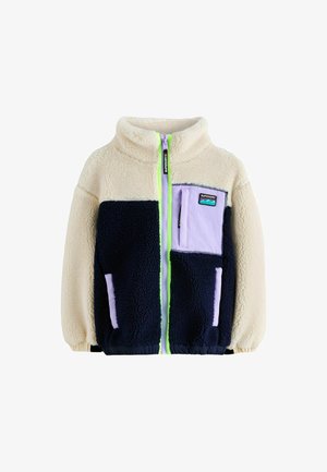 Cremefarvet og navy fleecejakke med lavendel lynlås og lomme, høj krave, elastiske manchetter og et lille Superdry logo patch på brystet.