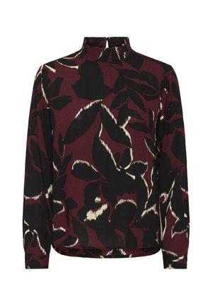 Blusa de manga larga con cuello alto con volantes, que presenta un gran patrón abstracto de hojas en negro y crema sobre un fondo burdeos oscuro.