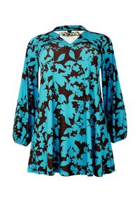 Tunique à imprimé floral en turquoise et marron, avec des manches longues, un décolleté en V et une coupe décontractée avec un ourlet évasé.