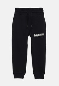 Schwarze Baumwoll-Jogginghosen mit elastischem Bund, Kordelzug und gerippten Bündchen. Mit weißem Logotext am linken Oberschenkel.