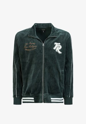 Dunkelgrüne Trainingsjacke mit Reißverschluss aus Velours, mit weißen Streifen, gerippten Bündchen sowie besticktem Text und Logo auf der Vorderseite.