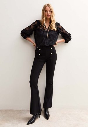 New Look GOLD BUTTON RIBBED FLARED LEG  - Broek - black