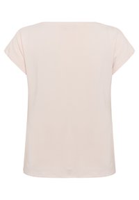 T-shirt à manches courtes, rose pâle, fabriqué en tissu doux avec une coupe ample et un col rond. Texture lisse, sans motifs ni quincaillerie visible.