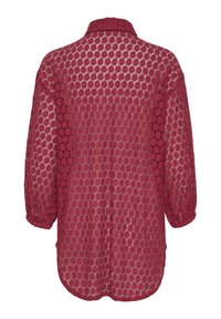 Reddish-brown loose-fit blouse made of textured lace with a circular pattern, featuring a collar and elasticized cuffs. Back view shown.
