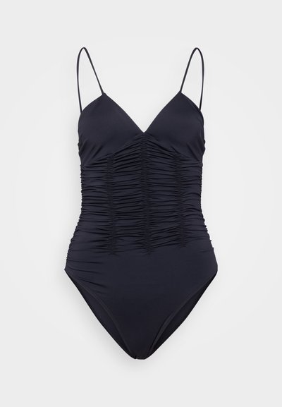 Čierny jednocdielny plavky s výstrihom do V, nastaviteľnými tenkými ramienkami a zhlukovaním na prednej strane pre textúru.